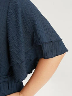 Plain Surplice Neck Ruffle Sleeve Pocket Belted Romper 23 Plain Surplice Neck Ruffle Sleeve Pocket Belted Romper -Bloomchic Shop 112244383 ml