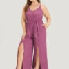 Plain Split Front Pocket Surplice Neck Belted Jumpsuit 2 Plain Split Front Pocket Surplice Neck Belted Jumpsuit -Bloomchic Shop 130971305 kz c9a6792e b3e0 4e57 bbe7 122b50c3a391
