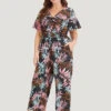 Tropical Print Knot Neck Shirred Wrap Jumpsuit 1 Tropical Print Knot Neck Shirred Wrap Jumpsuit -Bloomchic Shop 210282370 sj