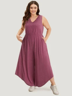 Plain Pocket Elastic Waist Asymmetrical Hem Jumpsuit