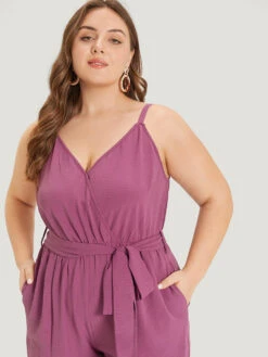 Plain Split Front Pocket Surplice Neck Belted Jumpsuit -Bloomchic Shop 452713373 vd 3bc2eb84 9b43 4dc8 b1d1 47f606a87d12