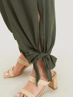 Plain Pocket Wrap Cut Out Knotted Hem Jumpsuit -Bloomchic Shop 540662769 al aaa8a744 5cd4 4b4b 958f f5605c260f0c