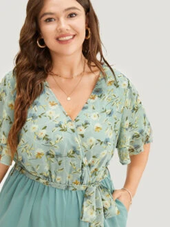 Floral Tiered Sleeve Belt Ruffle Pocket Wrap Jumpsuit 14 Floral Tiered Sleeve Belt Ruffle Pocket Wrap Jumpsuit -Bloomchic Shop 587976726 ly b3fad0b3 901a 43c5 8aec 39940aa5d996