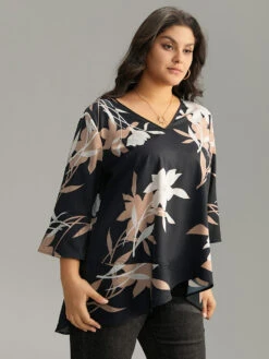 Floral Print Bell Sleeve Asymmetrical Hem Blouse 11 Floral Print Bell Sleeve Asymmetrical Hem Blouse -Bloomchic Shop 662723633 cx d319ef3c e104 4048 a873 3fa710f8ff7b