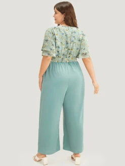 Floral Tiered Sleeve Belt Ruffle Pocket Wrap Jumpsuit 13 Floral Tiered Sleeve Belt Ruffle Pocket Wrap Jumpsuit -Bloomchic Shop 770318370 va 2d788711 e5dd 4340 9c63 1c587488b3ac