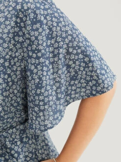 Ditsy Floral Ruffle Wrap Pocket Belted Romper -Bloomchic Shop 963930239 vp ea9318fb 7a1f 40c1 a59c 5b9c8d346713