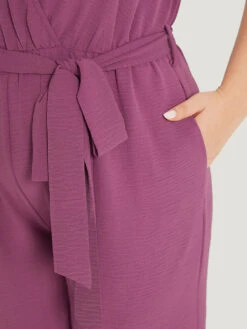 Plain Split Front Pocket Surplice Neck Belted Jumpsuit -Bloomchic Shop 98542126 sd fac0d367 46e9 49a8 95a6 864b20f9ac00